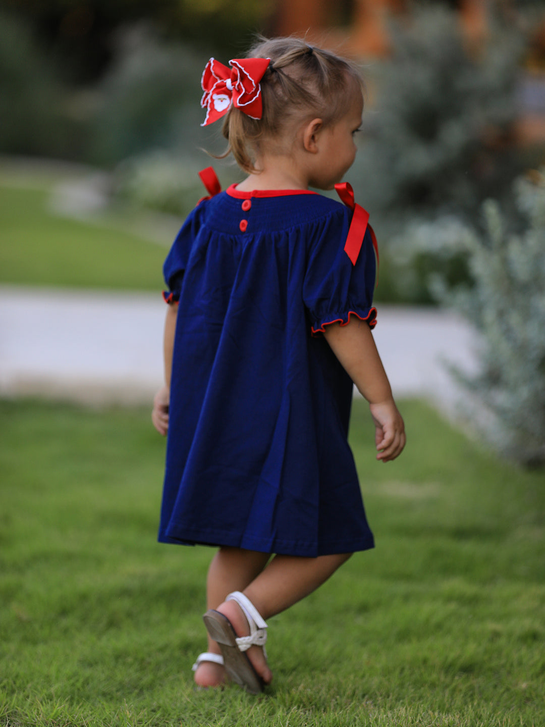Christmas Navy with Santa Sleigh Machine Smocked Dress Rylee Faith